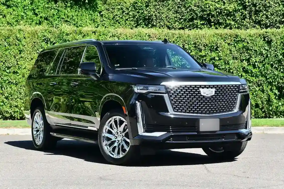 GMC Yukon or Cadillac Escalade